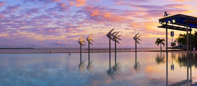 A photograph of the Cairns Lagoon in the city at sunset