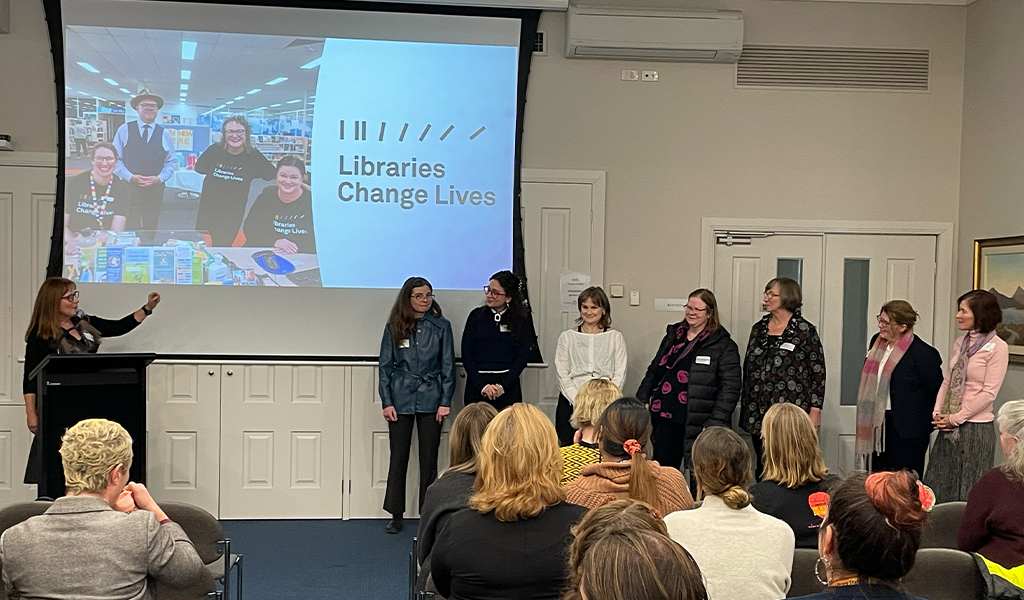 Suzy Goldsmith at left, seven of the Special Projects team at right, during the Festival of Ideas
