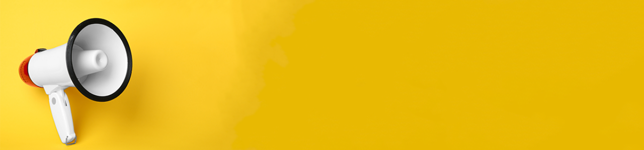 A megaphone is shown against a yellow background