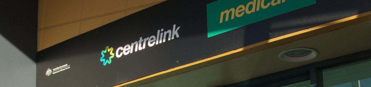 Cropped image of a Centrelink office sign